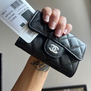 CHANEL Black Quilted Wallet with Silver Logo